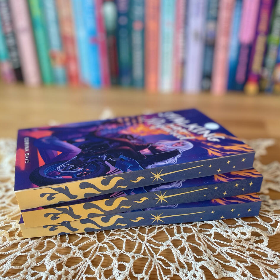 Dark blue sprayed edges with orange flames and yellow shooting star